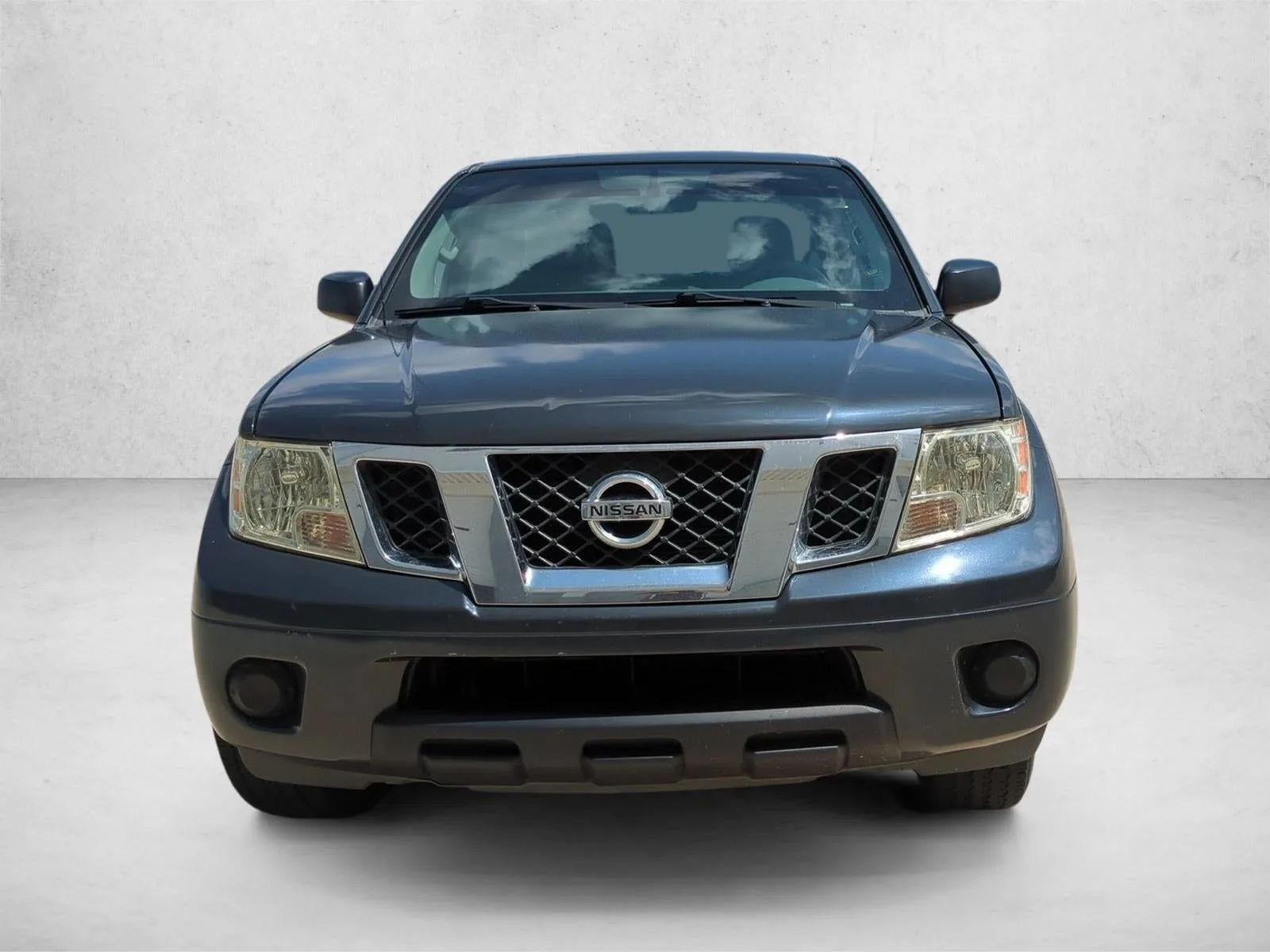 2012 Nissan Frontier 2WD Crew Cab SWB Auto SV photo 2