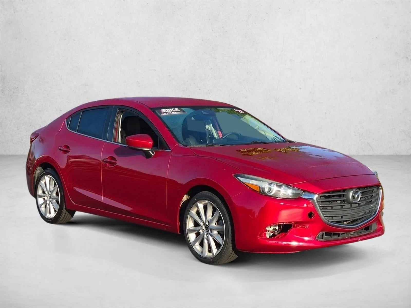 2017 Mazda Mazda3 4-Door Touring Auto photo 3